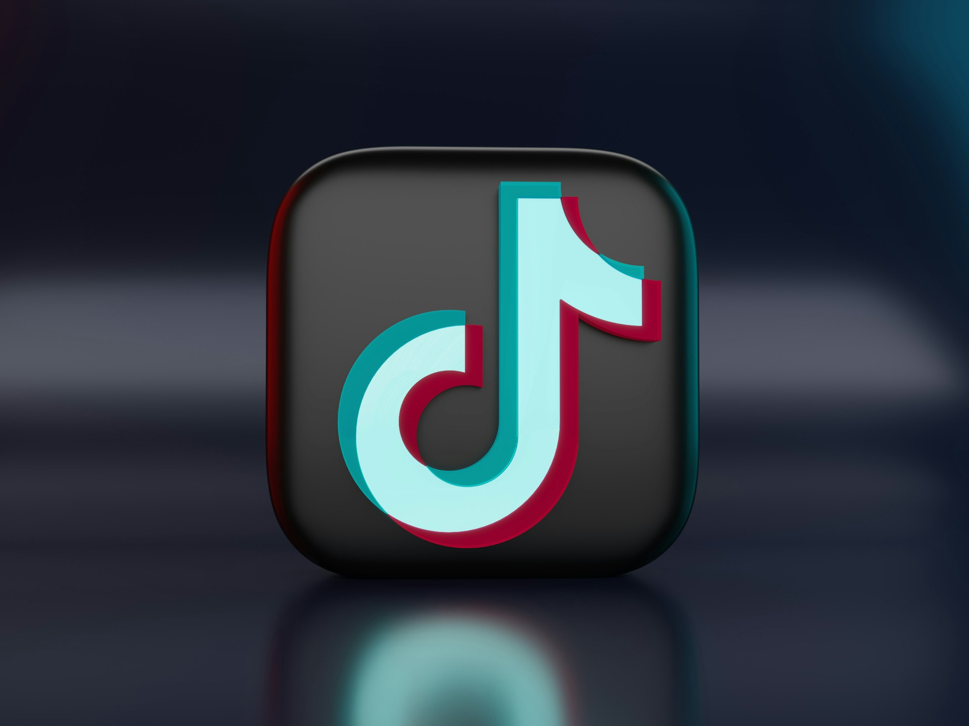 a black and blue icon with the letter j on it